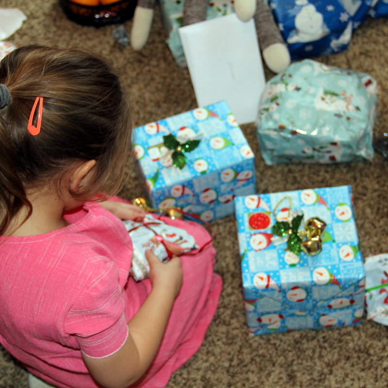 Madison opening presents at the Millers