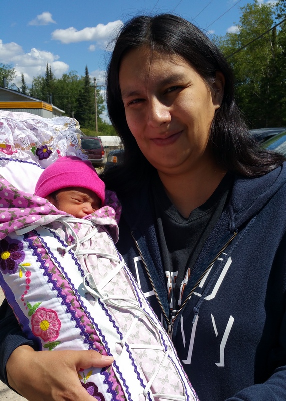 And here is the lucky baby, Angel, with her mother Kristen.