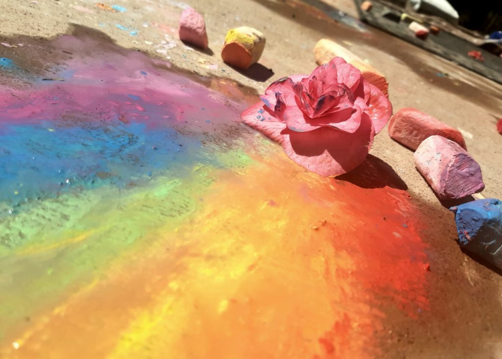 rainbow-colored chalk with rose